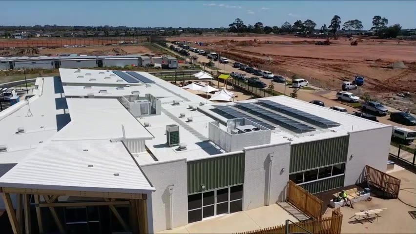 Elliston Community Centre roof with the growing Clyde estate behind