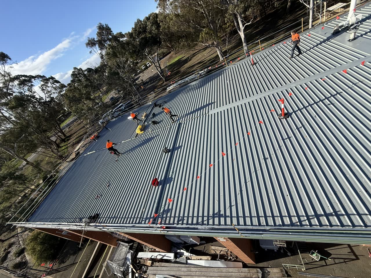 QP crew laying new APDECK 700 roof sheeting at Greater Western Water Melton