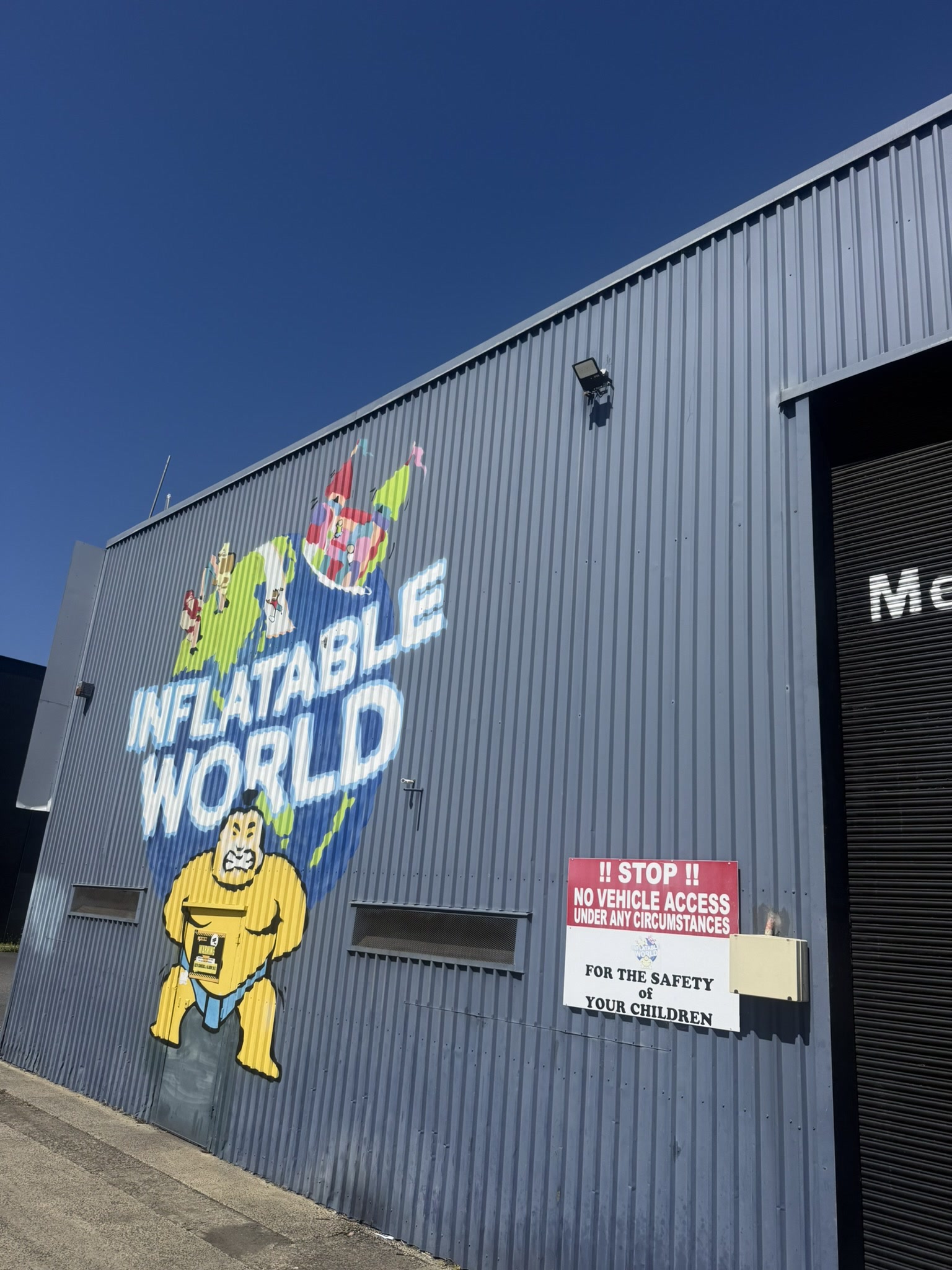 Sumo mural on the Inflatable World facade