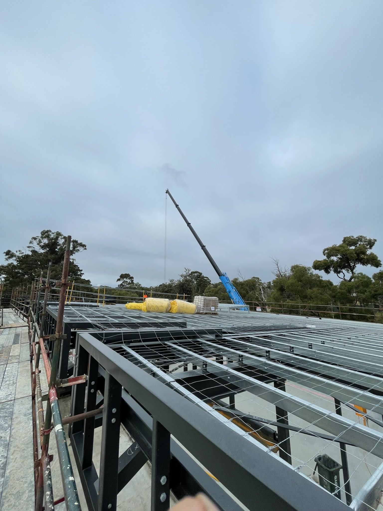 Curved corner cladding on the finished Lloyd Park Pavilion