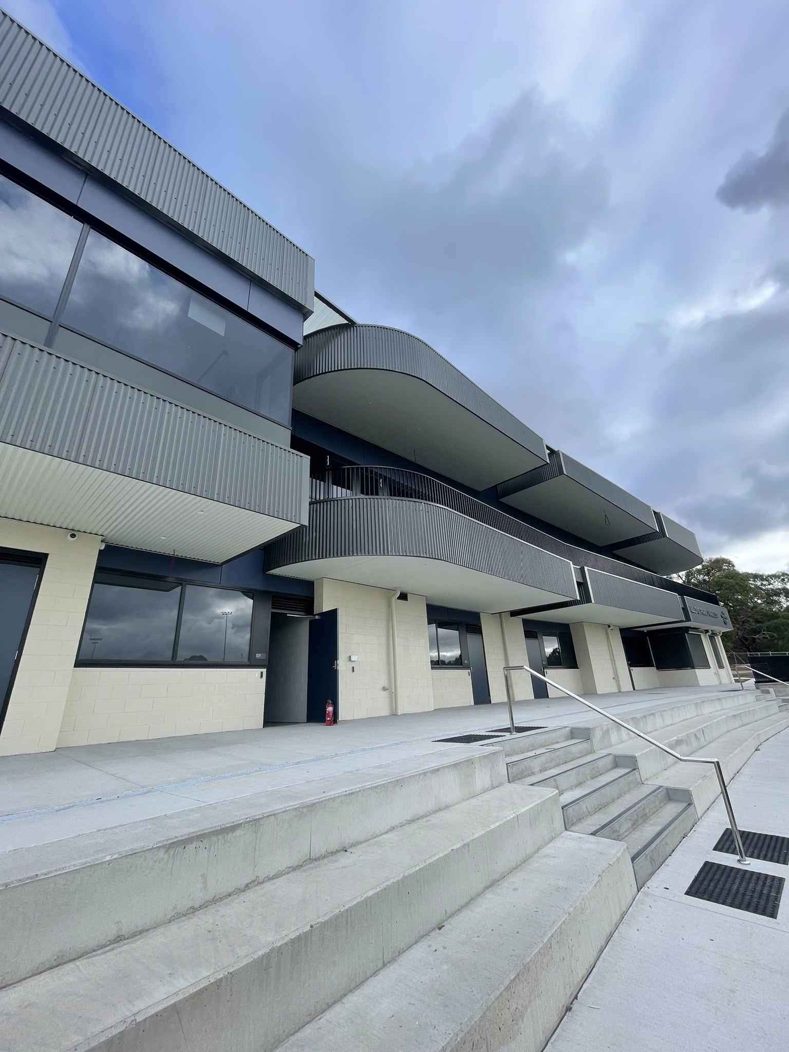 Curved custom orb cladding at Lloyd Park Pavilion