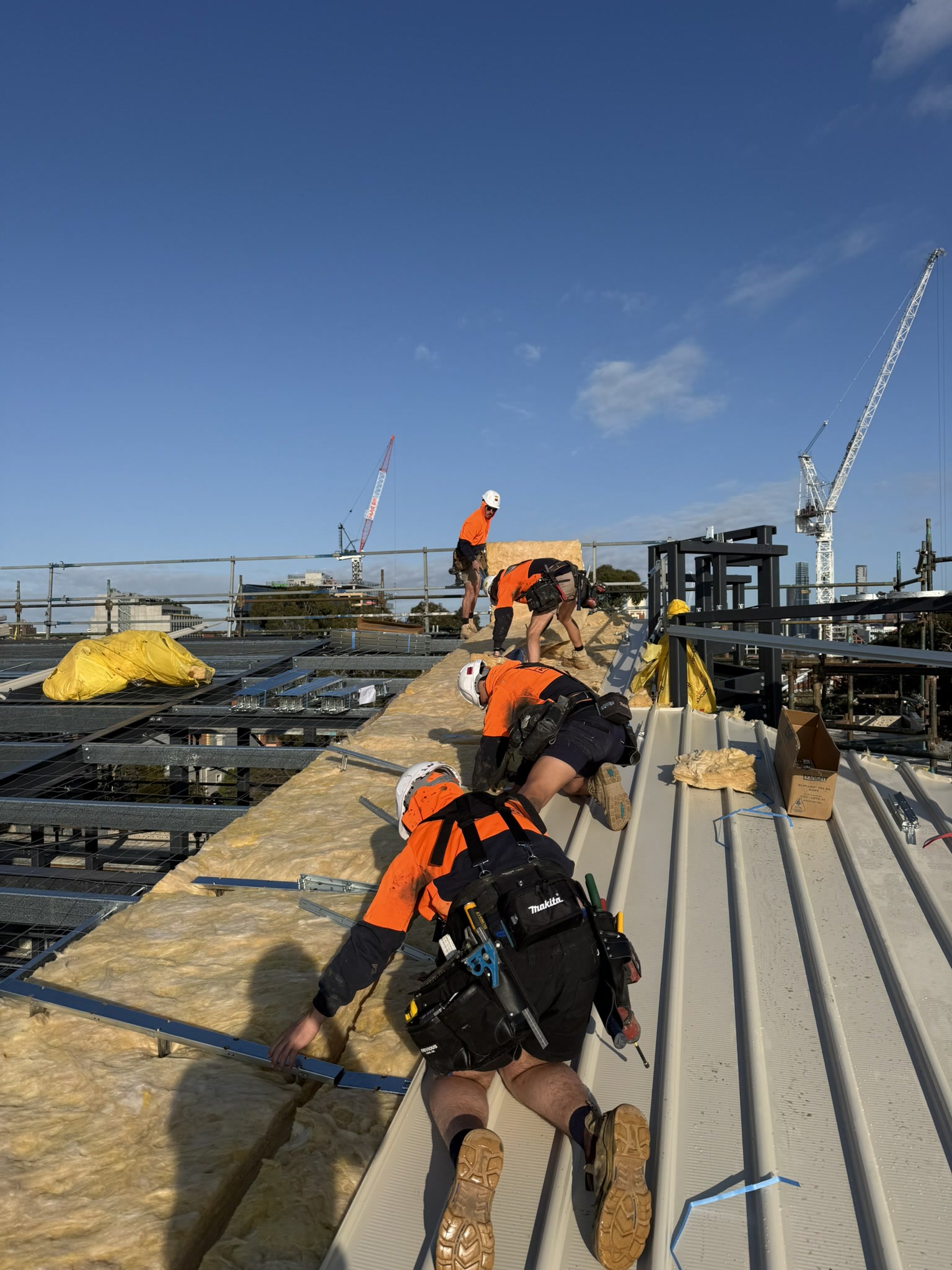 Klip-Lok sheeting going down over insulation at Richmond Primary School